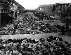 rows_of_bodies_of_dead_inmates_fill_the_yard_of_lager_nordhausen_a_gestapo_concentration_camp